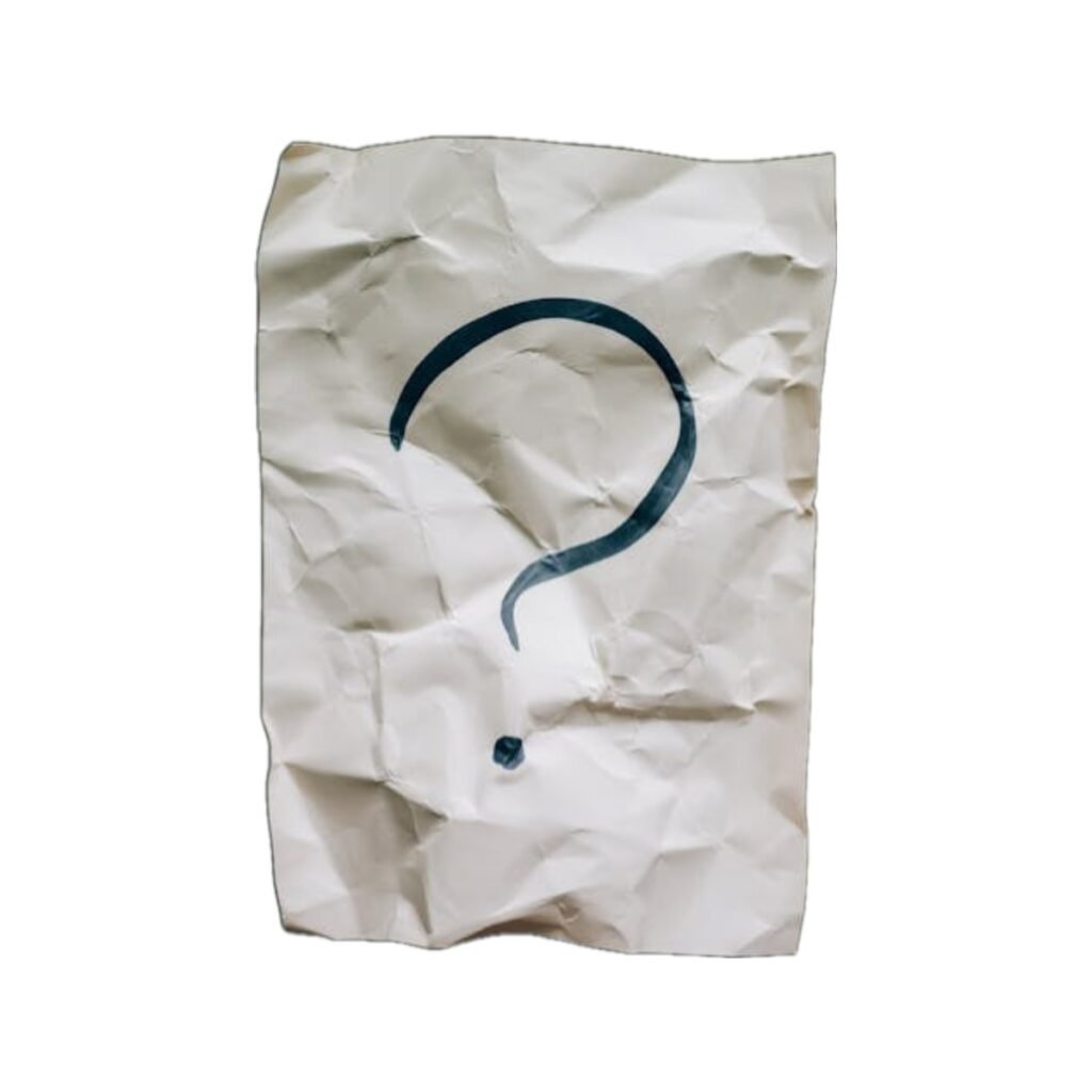Crumbled paper with a hand‑written question mark