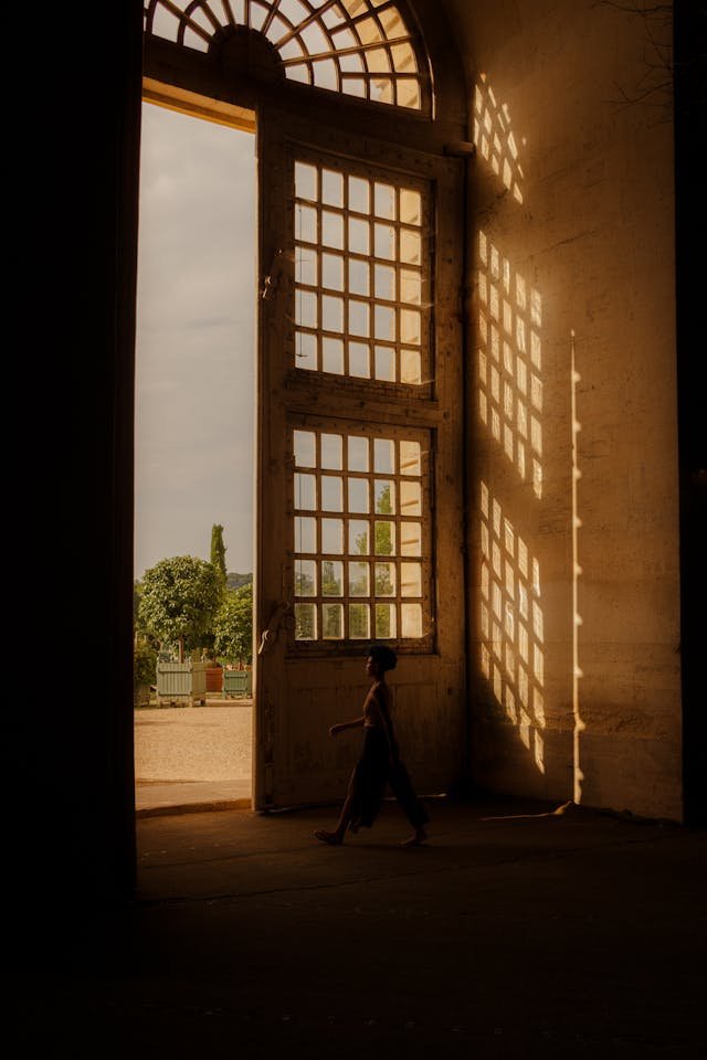 open door that opens to a beautiful outdoor scene